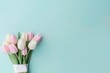 Beautiful composition spring flowers. Bouquet of pink white tulips flowers pastel blue background. Valentine's Day, Easter, Birthday, Happy Women's Day, Mother's Day. Flat lay, top view, copy space
