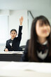 © Paylessimages - 教室で勉強している制服の高校生