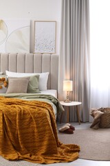 Poster - Comfortable bed with olive green linens in modern room interior