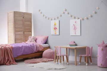 Canvas Print - Comfortable bed with pink linens in children's room