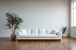 © soleg - a white sofa, indoor, in front of empty wall background
