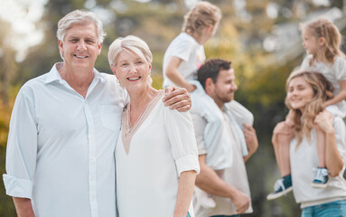 Canvas Print - Portrait of old couple in park together with big family, grandparents and parents with kids in backyard. Nature, happiness and men, women and children in garden with love, support and outdoor bonding