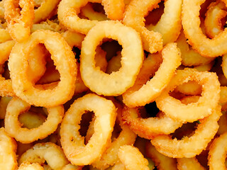 Sticker - fried onion rings on the white plate