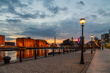 Liverpool Royal Albert Dock At Night With Lamp Post In The Foreground 