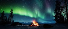 Composite Photo Showing A Comforting Campfire Under Starry Northern Lights