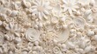  a close up of a wall made out of white paper flowers and spirally spirally spirally spirals.