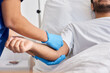 © LIGHTFIELD STUDIOS - cropped view of african american nurse inserting catheter into arm of her indian patient, healthcare