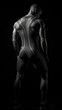 © Liana - The back of a muscular male form is highlighted, showcasing the power and potential of disciplined physical training.