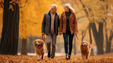 Fototapeta  - happy elderly couple walking together with their dog in the park in autumn
