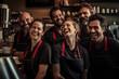 group of coffee baristas, frontline staff, restaurant servers, smiling, having fun in a coffee shop, cafe, restaurant, diner.  Concept of teamwork, collaboration, working together, 
