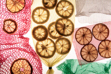 Lemon Slices In Colorful Mesh Bags