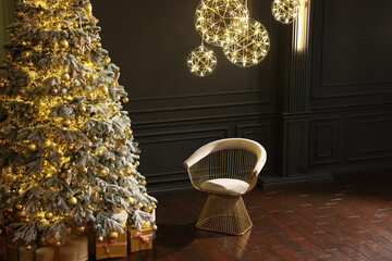 Wall Mural - Beautiful decorated Christmas tree, chair and festive decor indoors, space for text. Interior design