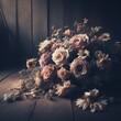 A bouquet of withered flowers on the floor