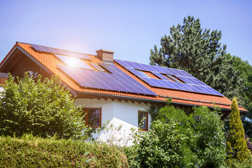 Wall Mural - Solar Panels on Roof of Private House. Eco House in Green City.