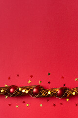 Wall Mural - red christmas background. top view photo of red christmas tree balls toys, holiday ribbon, gold star