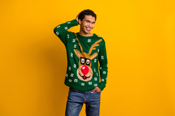 Canvas Print - Photo of good mood cheerful guy dressed christmas ugly print pullovers smiling hand head isolated yellow color background