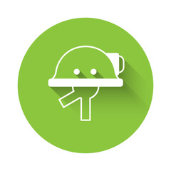 Sticker - White Miner helmet icon isolated with long shadow background. Green circle button. Vector