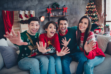 Sticker - Photo of group cheerful friendly people sitting sofa have good mood enjoy magic new year time apartment indoors