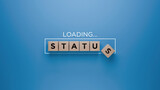 Fototapeta  - Wooden blocks spelling 'STATUS' with a loading progress bar on a blue background, social standing and ranking concept