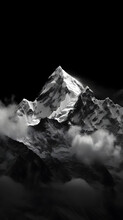 Professional Monochrome Photography Of A Snowy Mountain Peak In The Clouds. Graphic Black And White Poster Of A Snow Covered Mountain Range. Landscape Shot For Interior Painting.