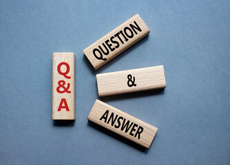 Wall Mural - Q and A - Question and Answer. Wooden cubes with words Q and A. Beautiful grey background. Business and Q and A concept. Copy space.