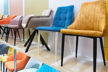 Poster - Many different chairs and armchairs on display in a furniture store