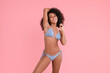 © New Africa - Beautiful woman in stylish bikini on pink background