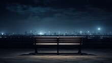  A Wooden Bench Sitting On Top Of A Stone Floor Next To A Night Time View Of A Cityscape.
