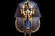 Egyptian Pharaoh funerary mask isolated on black background. Golden Mask of Tutankhamun. Traditions and customs of ancient Egypt