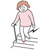 杖をついて階段を降りる女性