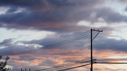 Wall Mural - the beautiful sunset view with the colorful clouds and warm sunlight