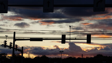Wall Mural - the beautiful sunset view with the colorful clouds and warm sunlight