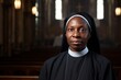 Mature Catholic nun: African American woman in apostolic standing with folded hands quietly smiling sweetly. Catholic nun preparing to serve God in church.