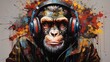 małpka kolorowa w słuchawkach muzycznych mamalowana na ścianie.