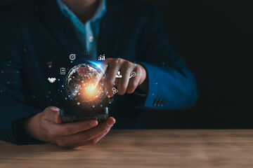 Wall Mural - digital market and business solution concept. businessman holding virtual global internet data conne