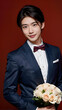 © anmitsu - Portfolio of a beautiful smiling handsome Asian man in a suit and tie holding a bouquet of red roses