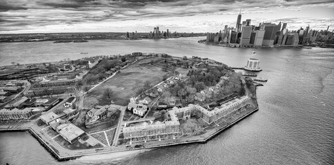 Wall Mural - Ellis Island aerial view from helicopter in winter season, New York City - USA