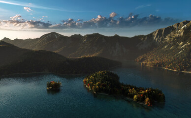 Wall Mural - Mountain lake surrounded by forested mountains during autumn at sunrise. High angle view.