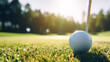 A macroscopic view of a golf ball atop a tee, alongside a set of golf clubs, at a links.
