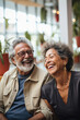 © Made360 - Mature multiracial couple enjoying a joyful moment together showcasing love warmth and happiness for lifestyle and retirement related usages