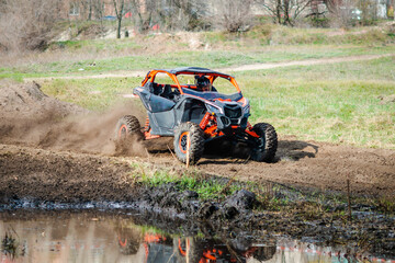 Wall Mural - ATV, buggy, quad and UTV offroad vehicle rally in dust with mud splash. Extreme, adrenalin. 4x4