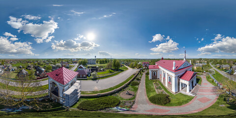 Wall Mural - aerial full hdri 360 panorama  view on white baroque catholic church in countryside or village in equirectangular projection with zenith and nadir. VR  AR content