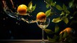 The juice of the orange on the branch is poured into the glass 