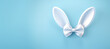 White  rabbit ears on pastel blue background for Easter