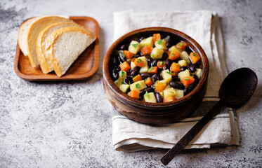 Wall Mural - Kidney beans potato carrot vegan soup in a bowl