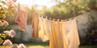 Laundry sways gently on a clothesline, bathed in the warm, golden sunshine of a backyard