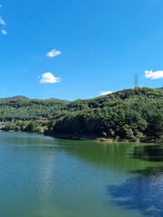 Canvas Print - A lake with water sparkling in the sunlight.