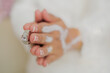 Hand of The Malay bride wears a wedding ring to the Malay groom.