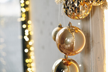 Wall Mural - Golden Christmas baubles decoration close up .Holiday concept.