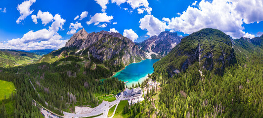 Canvas Print - south Tyrol, Italy .  One of the most beautiful mountain Alpine lakes - magic Lago di Braies, sorrounded by Dolomites mountains. aerial drone panoramic view.